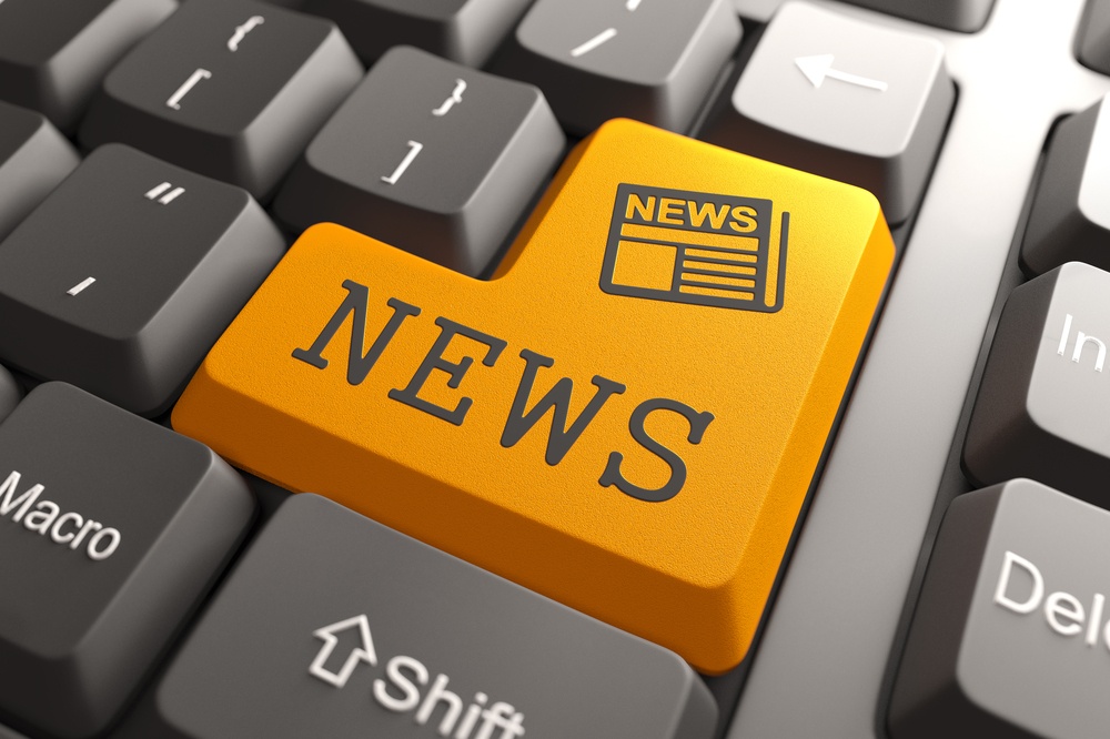 News - Orange Button with Newspaper Icon on Black Computer Keyboard. Mass Media Concept..jpeg